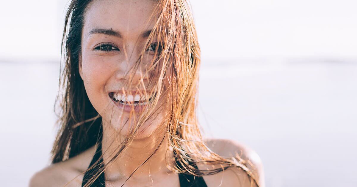 Vitamin_D_blog Woman on beach getting vitamin D